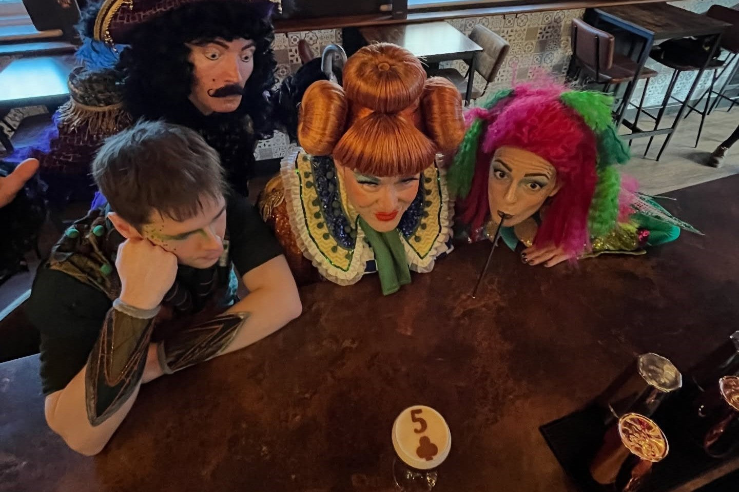 Raising a Glass to the Five of Clubs